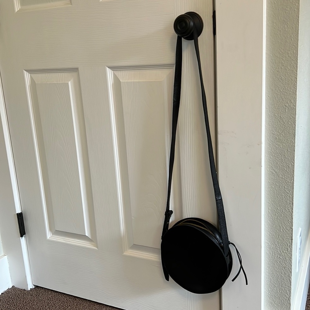 Madewell black leather circle crossbody bag
